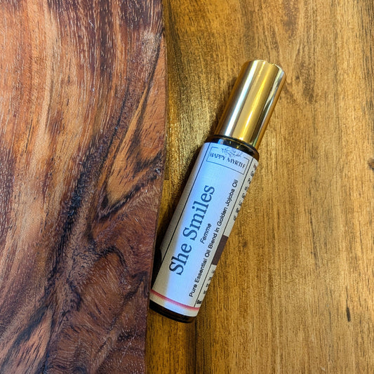 She smiles essential oil roll on