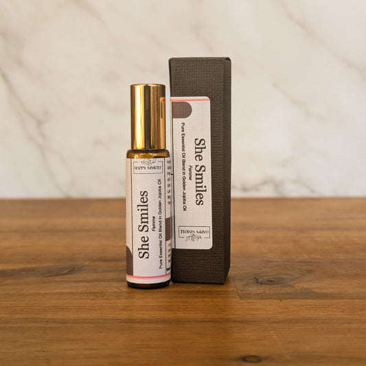She smiles essential oil roll on with box