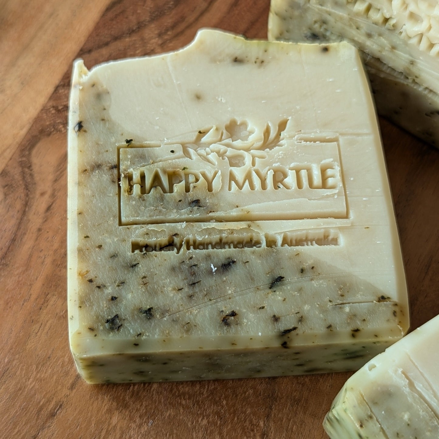 Close up of handmade coconut mint and rosemary soap